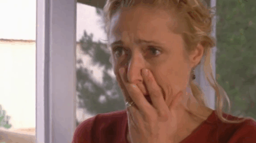 River's End - calico cat on washing machine jumping down and walking toward Sarah Caroline Goodall animated gif