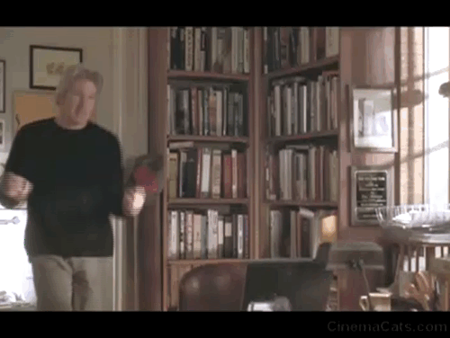 Runaway Bride - long-haired cat Italics sitting by food bowl as Ike Richard Gere passes animated gif