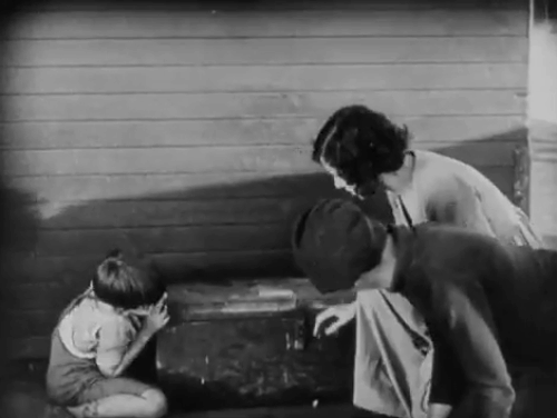 The Salvation Hunters - Georgia Hale, George K. Arthur and Bruce Guerin finding black cat inside wooden box animated gif