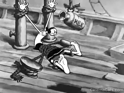 Shiver Me Timbers - Olive Oyl laughing while tied to ship deck with milk dripping on feet with little black cartoon cats licking them animated gif