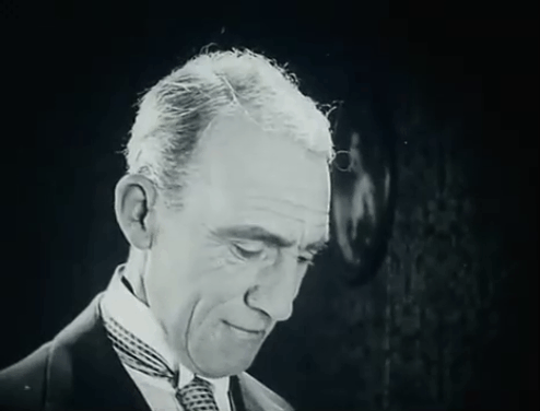 The Soul of Youth - Mr. Hodge Fred Huntley uncovering longhair gray cat Babe lying in bassinet animated gif