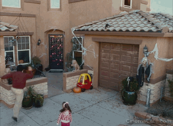 The Spy Next Door - Bob Jackie Chan rescues cat Ringo from roof animated gif