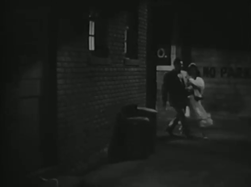 That's the Spirit - Slim Jack Oakie and Sheila Peggy Ryan in alley with black cat jumping down from trash can animated gif