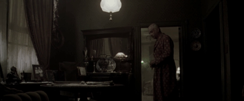 The Thirteenth Floor - cream colored longhair tabby cat hissing at Fuller Armin Mueller-Stahl animated gif