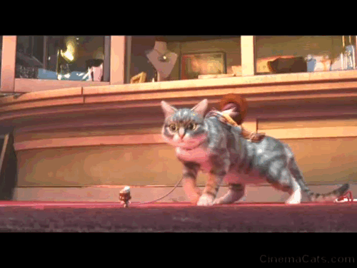 Toy Story 4 - tabby cat Dragon playing with and then swallowing Giggles McDimples animated gif