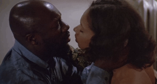 Truck Turner - ginger tabby cat Francis watching Annie Annazette Chase and Isaac Hayes kiss animated gif