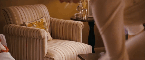 The Ugly Truth - brown tabby cat D'Artagnan watching with interest as Abby Katherine Heigl approaches puts on underwear animated gif