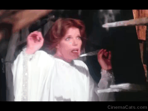 The Uncanny - ginger and white tabby cat Scat closing Edina Samantha Eggar in iron maiden animated gif
