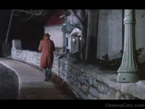 The Uncanny - black cat pulling on tether on street as Peter Cushing walks away animated gif
