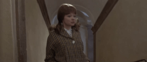 Vedo nudo - I See Naked - Manuella Véronique Vendell shocked by brown tabby cat after rolling down stairs in trash pail animated gif