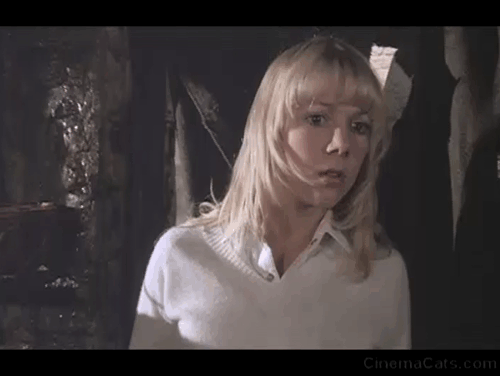 The Watcher in the Woods - black cat jumping on Jan Lynn-Holly Johnson and hissing animated gif