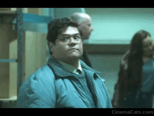 What We Do in the Shadows - Manhattan Night Club - Guillermo Harvey Guillén in Familiar room finding gray and white cat Sam in bucket animated gif