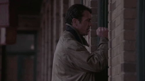 What Women Want - ginger tabby cat passing Nick Mel Gibson to push through door and run down hallway animated gif