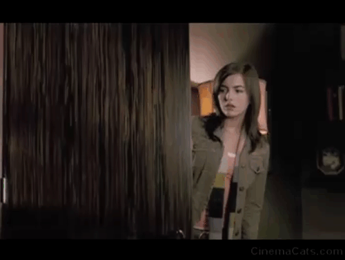 When a Stranger Calls - Jill Camilla Belle scared by black cat Chester jump scare animated gif