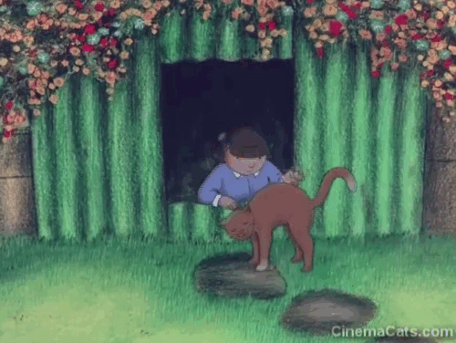 When the Wind Blows - little girl Hilda picking up and hugging cartoon brown cat inside bomb shelter animated gif
