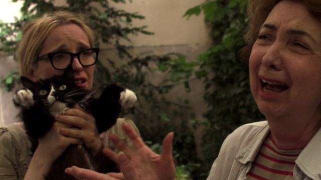 2 Days in Paris - Marion Julie Delpy holding tuxedo cat Max with Anna Marie Pillet