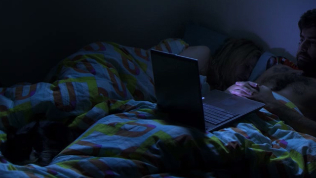 2 Days in Paris - tuxedo cat Max on bed with Jack Adam Goldberg