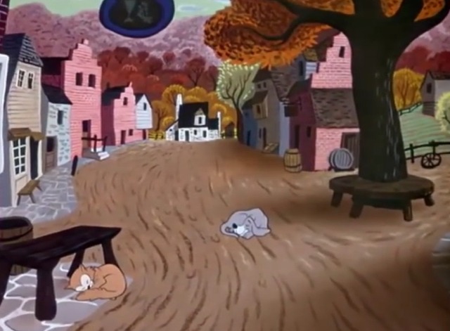 The Adventures of Ichabod and Mr. Toad - orange cat and dog seen sleeping in the street