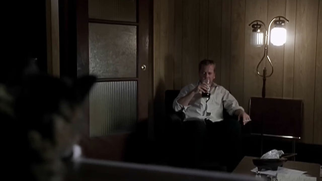 After Alice - Hayden Keifer Sutherland looking at longhair tabby and white cat seated on television