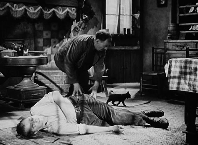 Against the Wind - Max Jack Warner dead on floor with Belgian helper and black cat nearby