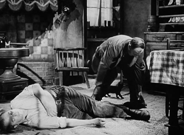 Against the Wind - Max Jack Warner dead on floor with Belgian helper and black cat nearby