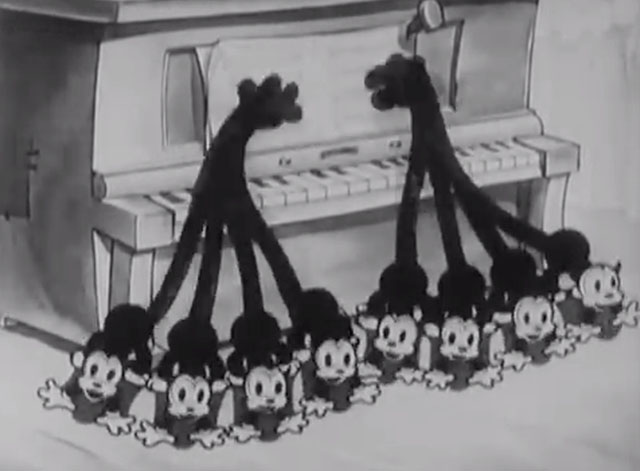 Ain't She Sweet? - cartoon black cats playing piano with their tails