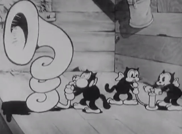 Ain't She Sweet? - cartoon black cats filling up with air from pump to play tuba