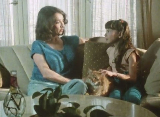 Alexander Baxter - longhair ginger tabby cat with little girl Melissa Judie Feldman talking to mom Wendy Kramon