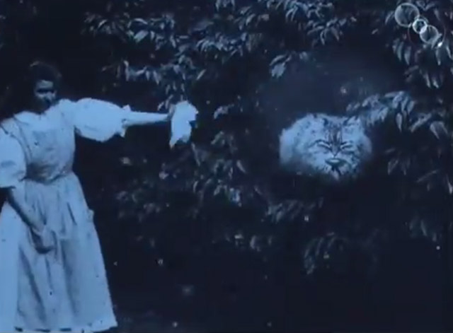 Alice in Wonderland 1903 - Alice May Clark waving at Cheshire Cat