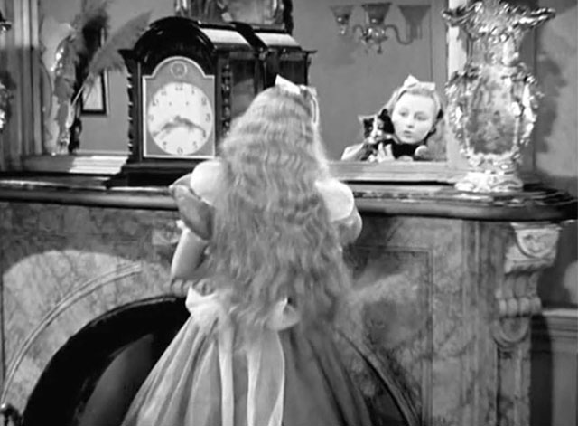 Alice in Wonderland - Alice Charlotte Henry looking into mirror with longhair calico cat Dinah