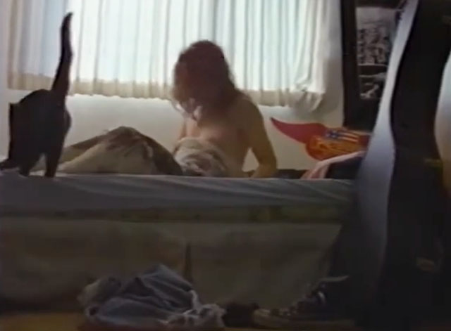 Alien Beach Party Massacre - black cat on bed of Glue Eric Zumbunnen