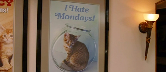 Anchorman 2 - I Hate Mondays poster with tabby cat in fish bowl