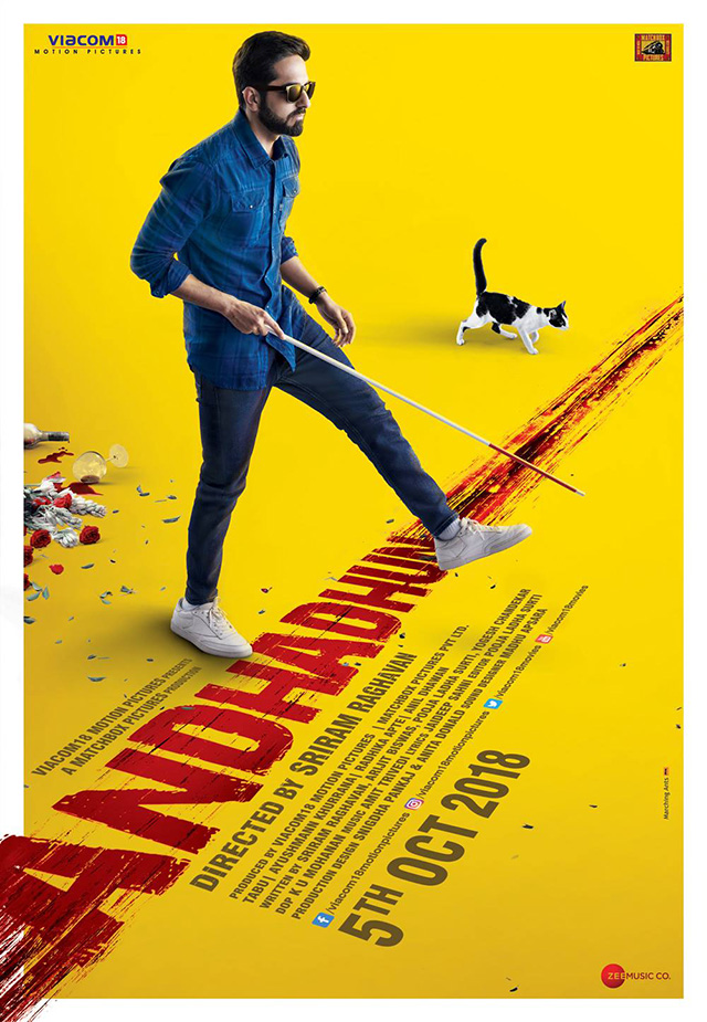 AndhaDhun - tuxedo cat Rani with Akash Ayushmann Khurrana on yellow movie poster
