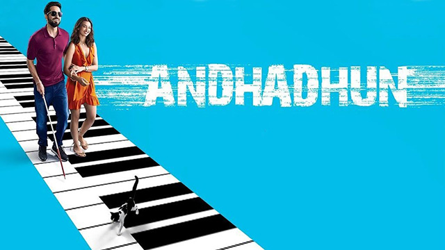 AndhaDhun - tuxedo cat Rani with Akash Ayushmann Khurrana and Simi Tabu on blue movie poster