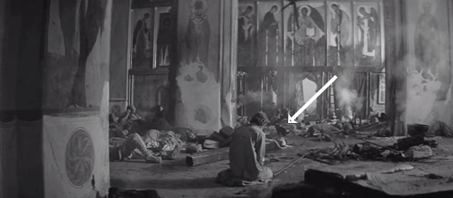 Andrei Rublev - black cat in foreground walking through devastation in church past Andrei Anatoliy Solonitsyn
