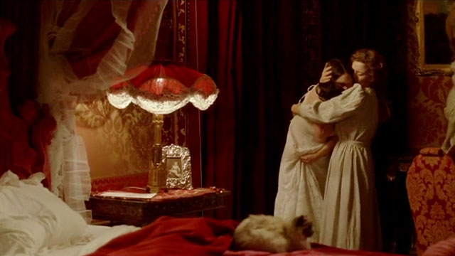 Angel - Romola Garai with Nora Lucy Russell and longhair seal point cat on bed