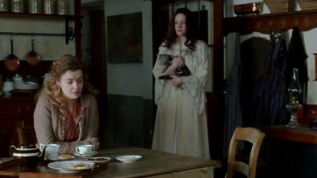 Angel - Romola Garai holding silver British shorthair tabby cat with Nora Lucy Russell