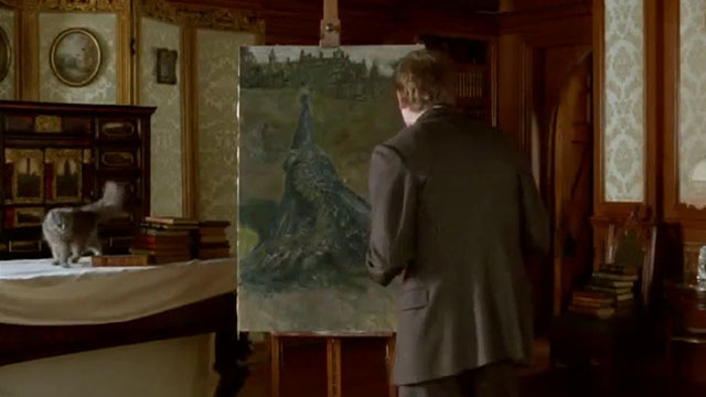 Angel - longhair gray cat standing by painting with journalist