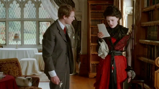 Angel - Romola Garai with journalist and longhair seal point cat