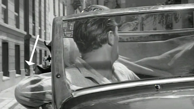 The Angry Hills - Mike Morrison Robert Mitchum in car with cat appearing in doorway in background