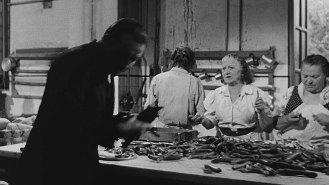 The Ape Woman - La donna scimmia - Antonio Ugo Tognazzi picking up black kitten from table with women working