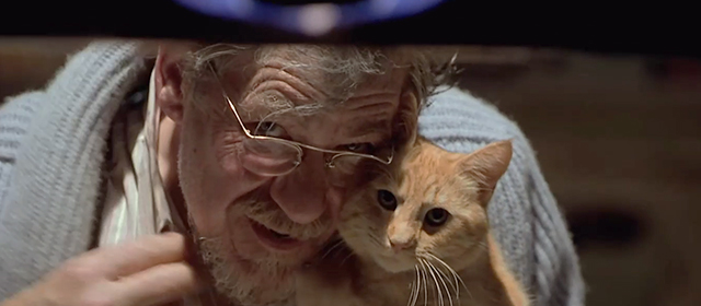 Apt Pupil - ginger tabby cat Timmy held by Kurt Dussander Ian McKellen