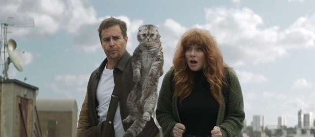 Argylle - Elly Bryce Dallas Howard with silver tabby Scottish fold cat Alfie Chip held over edge of roof by Aidan Sam Rockwell