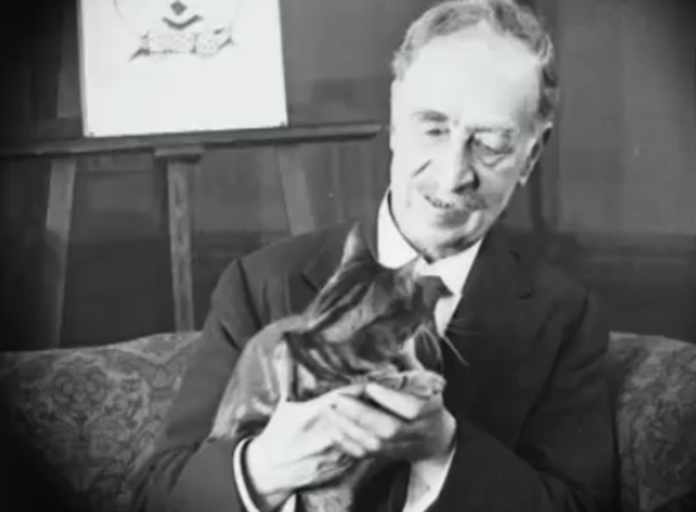 Art Celebrities at Home - Louis Wain holding tabby cat
