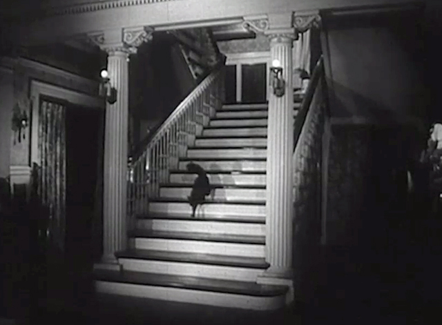 Monstrosity - The Atomic Brain - black cat Xerxes walking down stairs