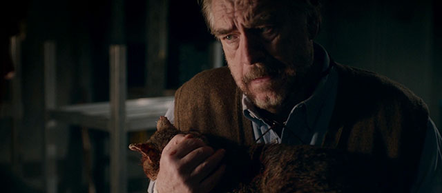 The Autopsy of Jane Doe - Mr. Tilden Brian Cox holding injured torbie cat Stanley Sydney
