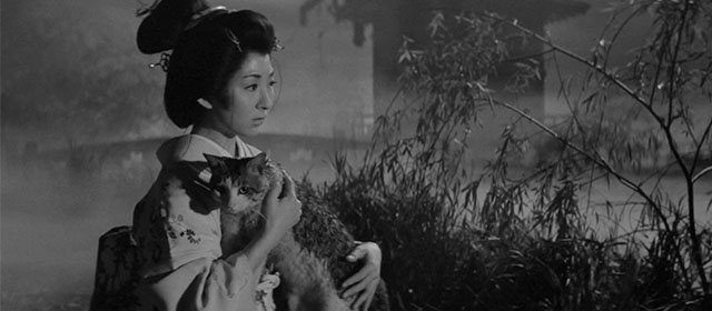 Bakeneko - Yukiji Kyoko Mikage holding tabby and white cat Tama in swamp