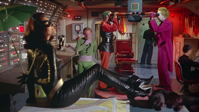Batman the Movie - Catwoman Lee Meriwether scratching back with black cat Hecate at her feet on submarine