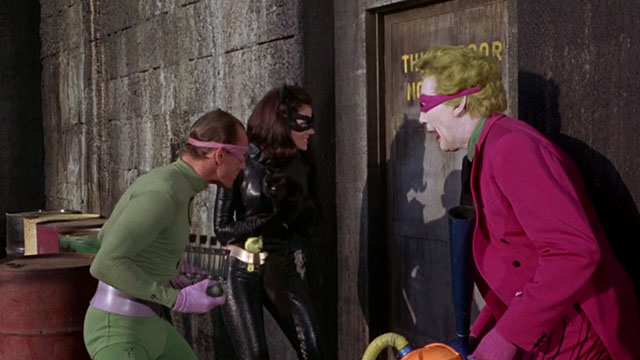 Batman the Movie - Catwoman Lee Meriwether holding black cat Hecate with Joker Cesar Romero and Riddler Frank Gorshin outside door