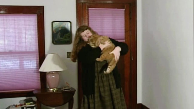 Beauty Queen Butcher - Phyllis Rhona Brody holding longhair ginger tabby cat Eartha